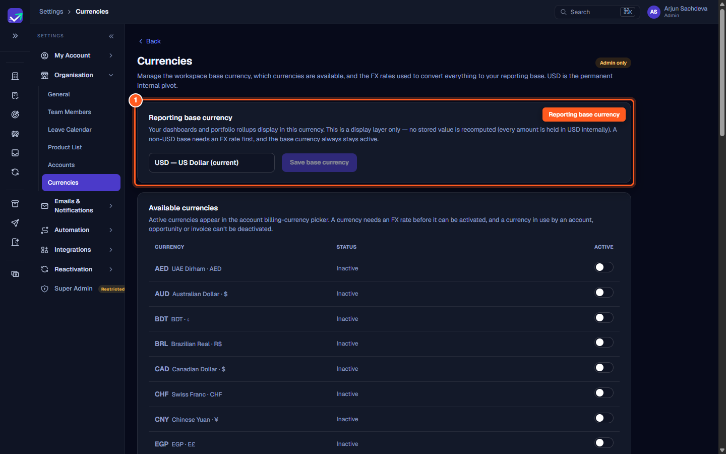 The Reporting base currency card showing the currency selector dropdown and Save base currency button